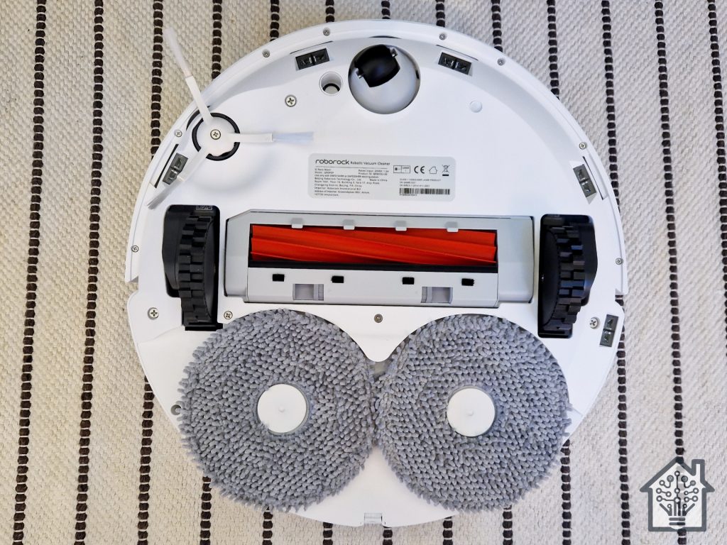 Roborock Q Revo MaxV underside showing the mop pads and bristeless brush roller