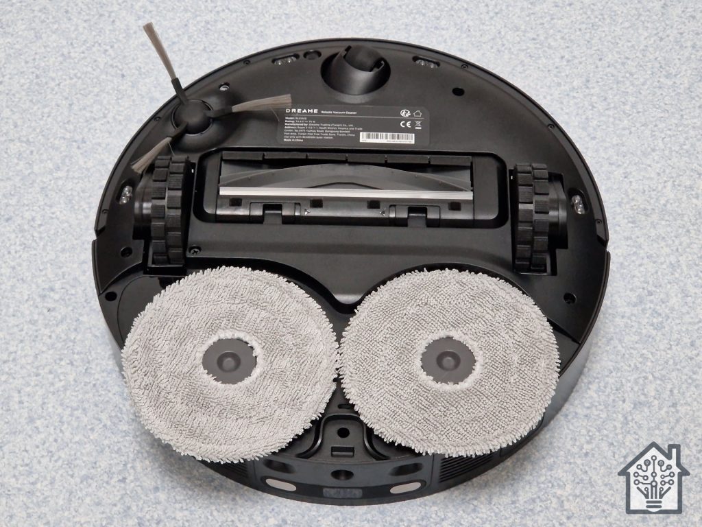 DreameBot X30 Ultra underside showing the bristleless brush roller and mop pads
